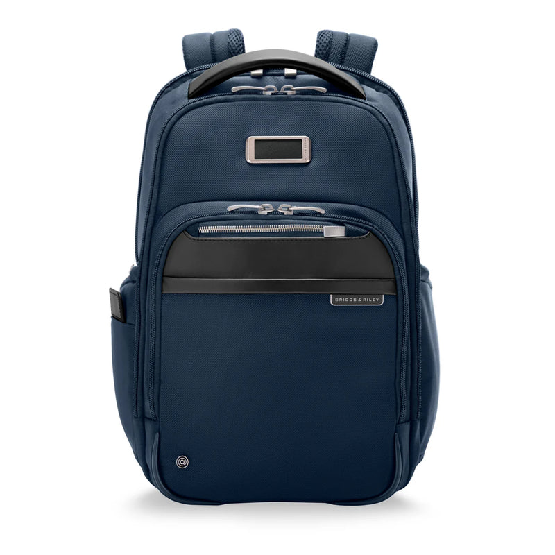 Briggs & Riley @work medium backpack in black, front view showing multiple compartments and sturdy straps for daily use.