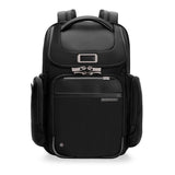 Briggs & Riley @work medium widemouth backpack with front zipper pocket and adjustable shoulder straps on a plain background.