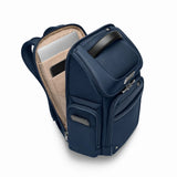 Briggs & Riley @work medium backpack interior with padded laptop compartment and organized storage pockets.