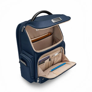 Briggs & Riley @work medium wide-mouth backpack interior showing main compartment with organized pockets and padded laptop sleeve.