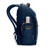 Briggs & Riley @work medium widemouth backpack shown from the side, featuring a sleek design and multiple compartments.