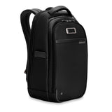 Briggs & Riley @work slim backpack shown from an angled view, featuring a sleek black design with multiple compartments and padded straps.
