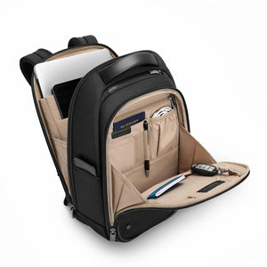 Interior view of Briggs & Riley @work Slim Backpack showing organized compartments and padded laptop sleeve.
