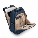 Interior view of Briggs & Riley @work slim backpack showing organized compartments and padded laptop sleeve.
