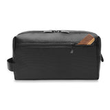 Briggs & Riley black Everyday Essentials Kit with travel toiletries and accessories, compact and organized for travel.