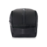 Black Briggs & Riley Everyday Essentials Kit with organized compartments and travel accessories, designed for convenient packing.