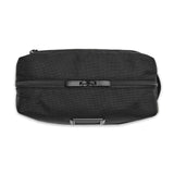 Black Briggs & Riley Everyday Essentials Kit with organized compartments and travel accessories for convenience.