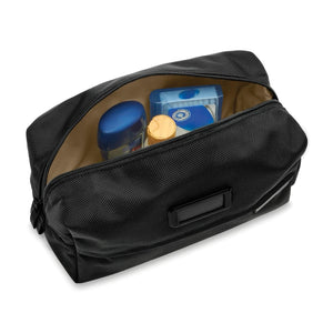 Briggs & Riley Everyday Essentials Kit includes organized travel accessories in a sleek black case.