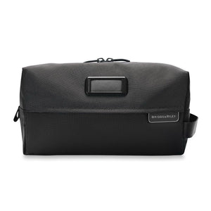 Briggs & Riley Everyday Essentials Kit with organized compartments and travel accessories in a black compact case.