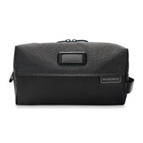 Briggs & Riley Everyday Essentials Kit with organized compartments and travel accessories in a black compact case.
