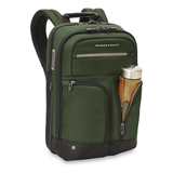 Black Briggs & Riley H-T-A Slim Expandable Backpack with multiple compartments and padded shoulder straps, designed for travel and daily use.