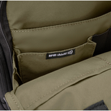 Briggs & Riley HTA medium cargo backpack with multiple compartments and padded straps, designed for travel and daily use.
