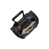 Blue Briggs & Riley Baseline cabin spinner carry-on luggage with four wheels and telescoping handle, designed for travel convenience.