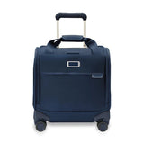 Briggs & Riley Baseline cabin spinner carry-on luggage with four wheels, hard-shell design, and extended handle.