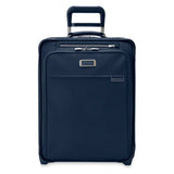 Briggs & Riley Baseline Global 2-Wheel Carry-On luggage showing black hard-shell exterior and telescoping handle.