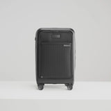 Black Briggs & Riley Sympatico Essential 22-inch expandable spinner carry-on luggage with front pocket and smooth wheels.