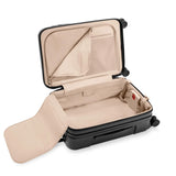 Black Briggs & Riley Sympatico Essential 22-inch expandable carry-on spinner with front pocket and durable design.