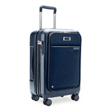 Black Briggs & Riley Sympatico Essential 22" expandable spinner carry-on luggage with front pocket and four wheels.