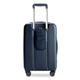 Black Briggs & Riley Sympatico Essential 22-inch expandable spinner carry-on luggage with front pocket and smooth wheels.