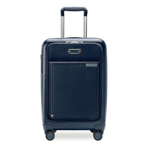 Black Briggs & Riley Sympatico Essential 22-inch expandable spinner carry-on luggage with front pocket and four wheels.