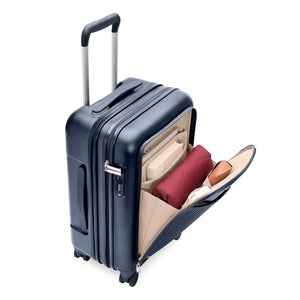 Black Briggs & Riley Sympatico Essential 22-inch expandable spinner carry-on luggage with front pocket and smooth wheels.