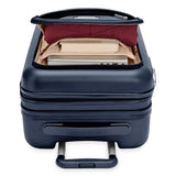 Black Briggs & Riley Sympatico Essential 22-inch expandable spinner carry-on luggage with front pocket, durable travel suitcase.
