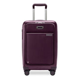 Black Briggs & Riley Sympatico Essential 22-inch expandable spinner carry-on luggage with front pocket and smooth wheels.