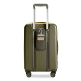 Briggs & Riley Sympatico Essential expandable carry-on spinner luggage with black hard shell and four wheels, viewed from the back.