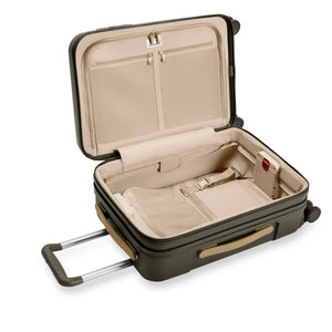 Briggs & Riley Sympatico Essential carry-on spinner luggage interior with organized compartments and packing space.