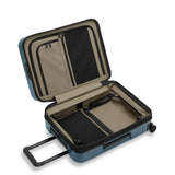Open view of Briggs & Riley ZDX 21-inch expandable hardside carry-on spinner luggage with interior compartments.