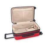 Briggs & Riley Sympatico Essential Carry-On Spinner luggage with glossy ruby finish, interior view showing compartments and organization.