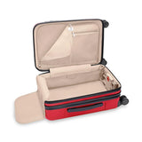 Interior view of Briggs & Riley Sympatico Essential Carry-On Spinner luggage in glossy ruby with compartments and packing space.