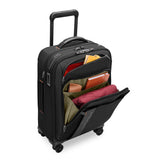 Interior shot of Briggs & Riley ZDX Essential Carry-On Expandable Spinner luggage showing kangaroo pocket and organized compartments.