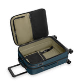 Interior view of Briggs & Riley ZDX Essential Carry-On Expandable Spinner luggage showing organized compartments and durable fabric.