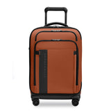 Briggs & Riley ZDX Essential Carry-On Expandable Spinner suitcase with four wheels and telescoping handle on a white background.