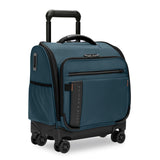 Briggs & Riley ZDX cabin spinner carry-on luggage with four wheels and sleek black design, viewed from an angled perspective.