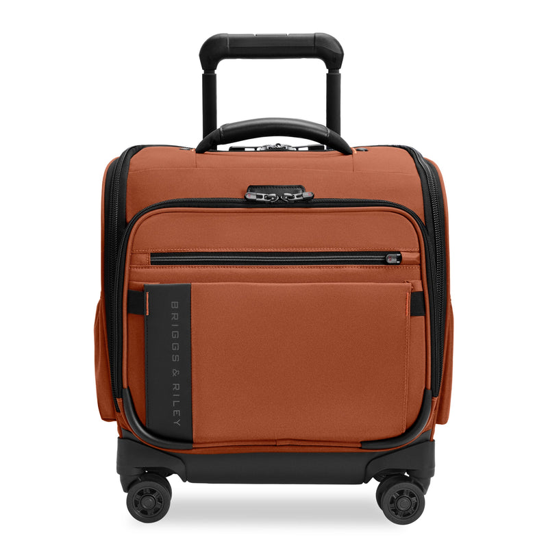 Briggs & Riley ZDX cabin spinner carry-on luggage with front view showing durable hard shell and 4 spinner wheels.