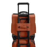 Briggs & Riley ZDX cabin spinner carry-on luggage with interlocking handle and four wheels for easy travel.
