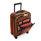 Interior view of Briggs & Riley ZDX Global Carry-On Spinner with kangaroo pocket for organized packing.