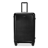 Black Briggs & Riley Sympatico large expandable checked luggage spinner with four wheels and a sturdy handle.