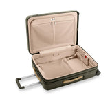 Black Briggs & Riley Sympatico medium expandable checked luggage spinner with four wheels and sturdy handle.