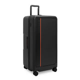 Black Briggs & Riley ZDX 32-inch hardside checked luggage with four spinner wheels and a sturdy, sleek design.