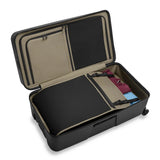 Black Briggs & Riley ZDX 32-inch hardside checked luggage with four spinner wheels and a sleek, durable design.
