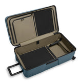 Black Briggs & Riley ZDX extra large 32-inch hardside checked luggage with spinner wheels and sturdy design.