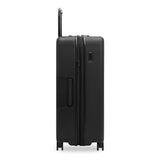 Black Briggs & Riley ZDX large 30-inch hardside expandable spinner checked luggage with four wheels and TSA lock.
