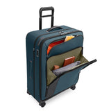 Black Briggs & Riley ZDX large expandable spinner checked luggage with four wheels and telescopic handle.