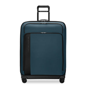 Black Briggs & Riley ZDX large expandable spinner checked luggage with four wheels and telescoping handle.