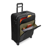 Black Briggs & Riley ZDX large expandable spinner checked luggage with four wheels and sturdy handle.
