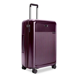 Briggs & Riley Sympatico large expandable plum checked luggage with spinner wheels, durable hard-shell design, and spacious interior.