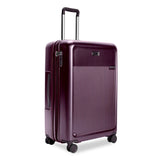 Briggs & Riley Sympatico large expandable plum checked luggage with spinner wheels, durable hard-shell design, and spacious interior.